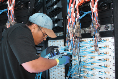 data center technician doing data center cabling